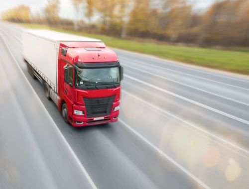 Truck driving on the freeway top view medium plan